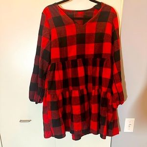 Fun buffalo plaid mini dress with pockets.